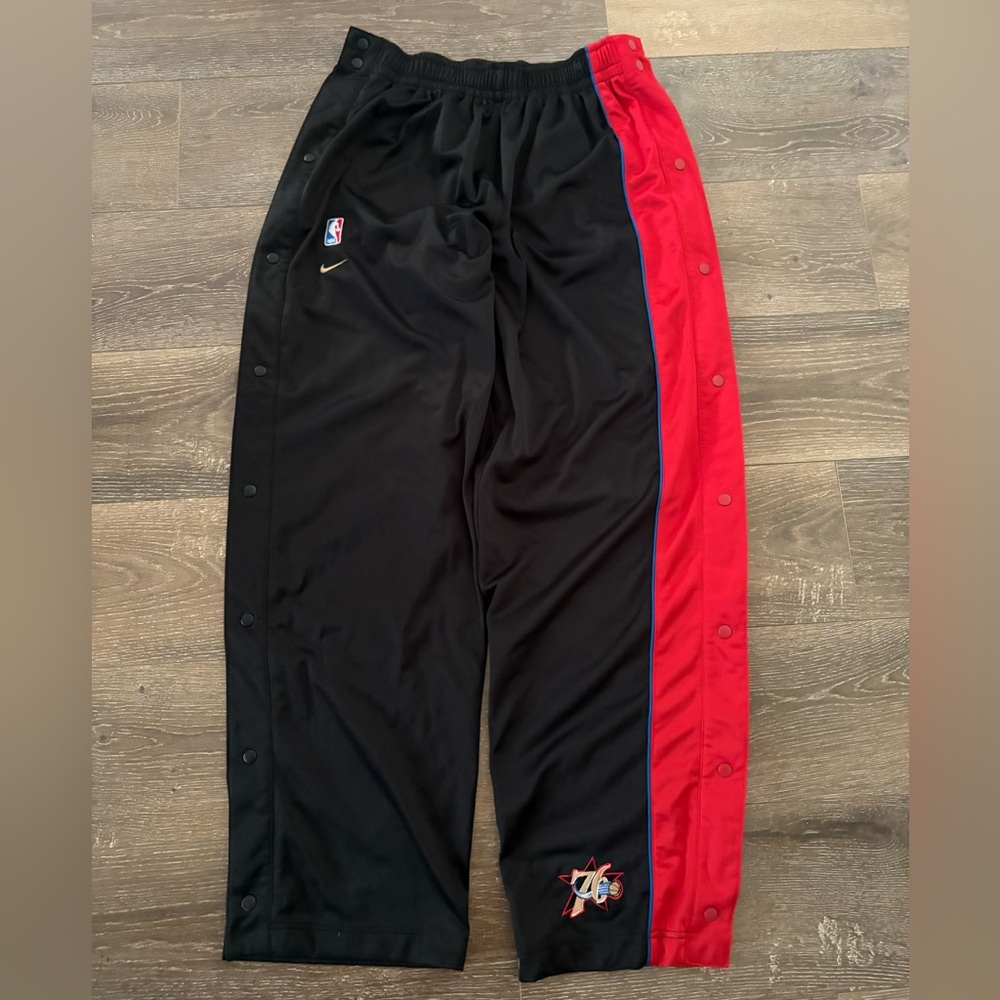 Nike Black and Red Sweatpants with Bold Stripe